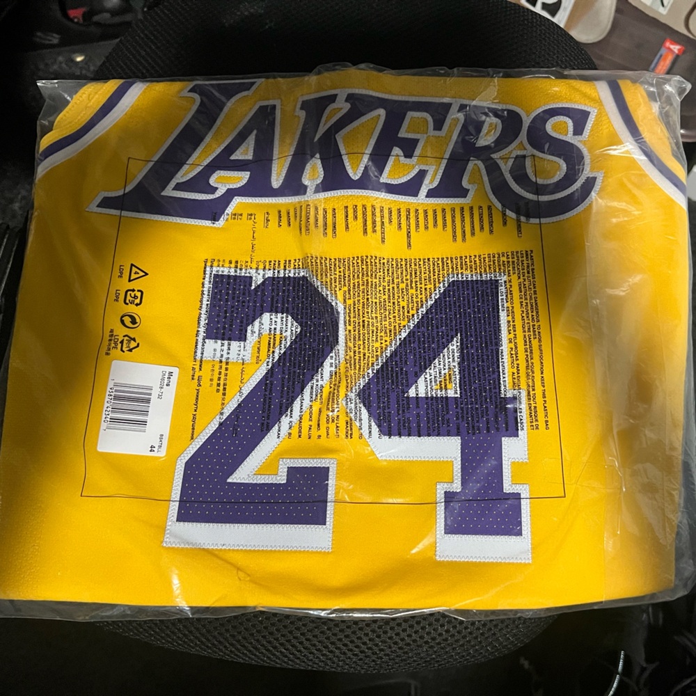 Nike Yellow Jersey with Purple Swoosh